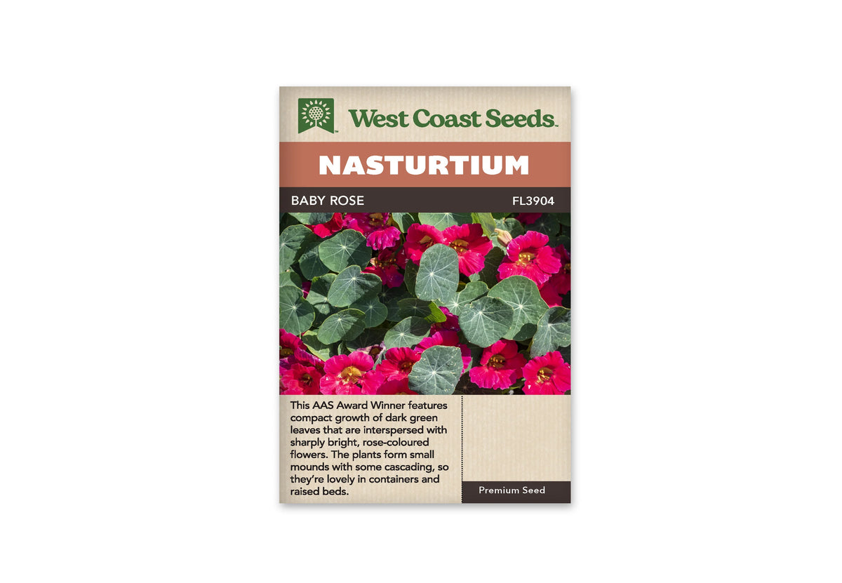 Sachet Baby Rose de West Coast Seeds sur fond blanc. Des fleurs rose vif à centre jaune se mêlent à des feuilles rondes vert foncé, parcourues de nervures claires en étoile. Les pétales présentent des bords ondulés. Le bandeau orange indique Nasturtium; la bande brune porte Baby Rose et le code FL3904. Le texte mentionne une récompense AAS.