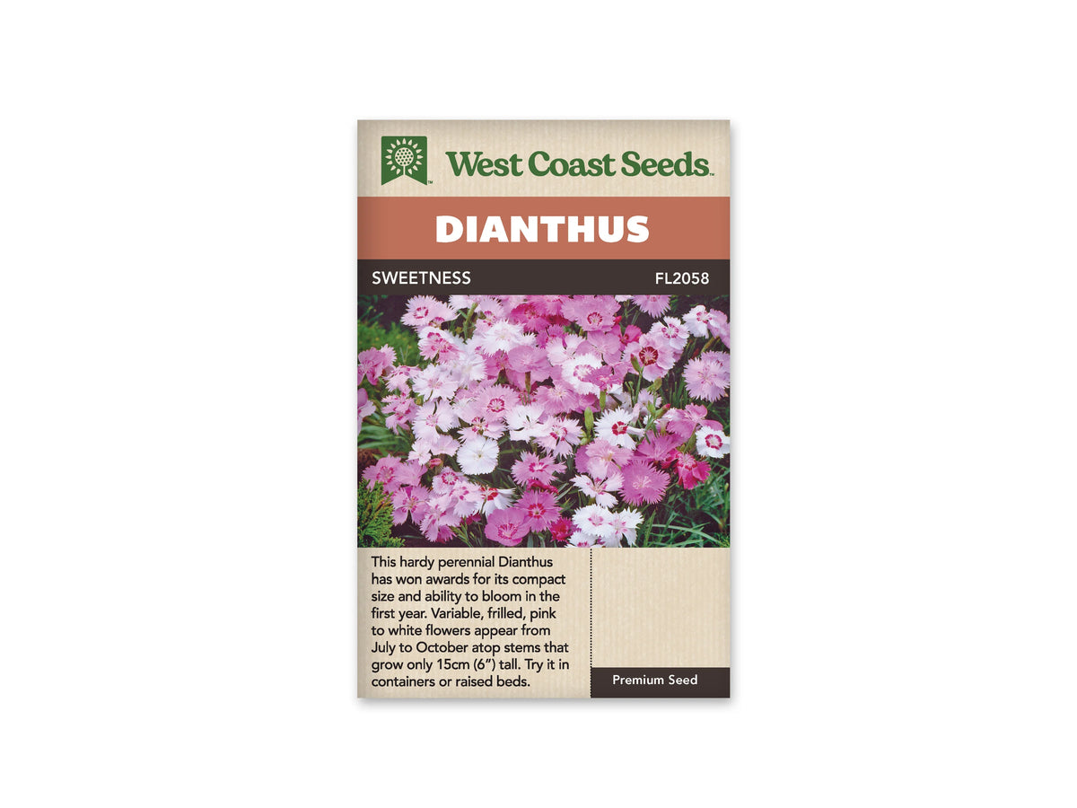Sachet Sweetness de West Coast Seeds sur fond blanc. Une touffe dense porte des fleurs roses et blanches aux bords très découpés. Plusieurs ont un anneau rose foncé près du centre. De fines feuilles vertes apparaissent entre les fleurs. Le bandeau orangé indique Dianthus, puis la bande brune porte Sweetness et la référence FL2058.