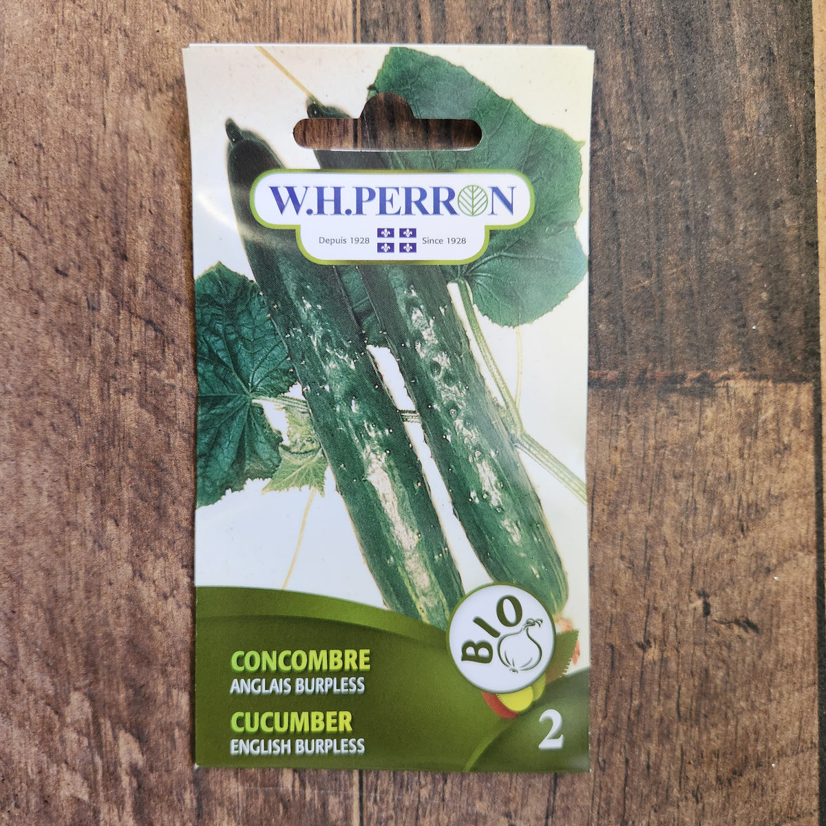 Sachet de semences W.H. Perron : Concombre anglais bio (Cucumis sativus ‘Burpless’). L’emballage présente le nom de la sélection et une illustration de la plante ou de la récolte. Cette photographie montre la face avant du sachet, avec les renseignements imprimés visibles et les éléments graphiques qui permettent de reconnaître le produit parmi les autres semences de la gamme.