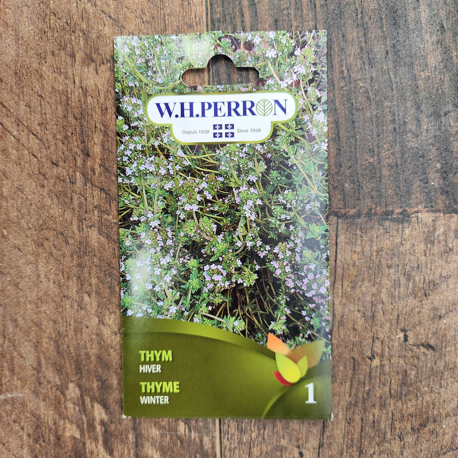 Sachet de semences W.H. Perron : Thym d'hiver (Thymus vulgaris). L’emballage présente le nom de la sélection et une illustration de la plante ou de la récolte. Cette photographie montre la face avant du sachet, avec les renseignements imprimés visibles et les éléments graphiques qui permettent de reconnaître le produit parmi les autres semences de la gamme.