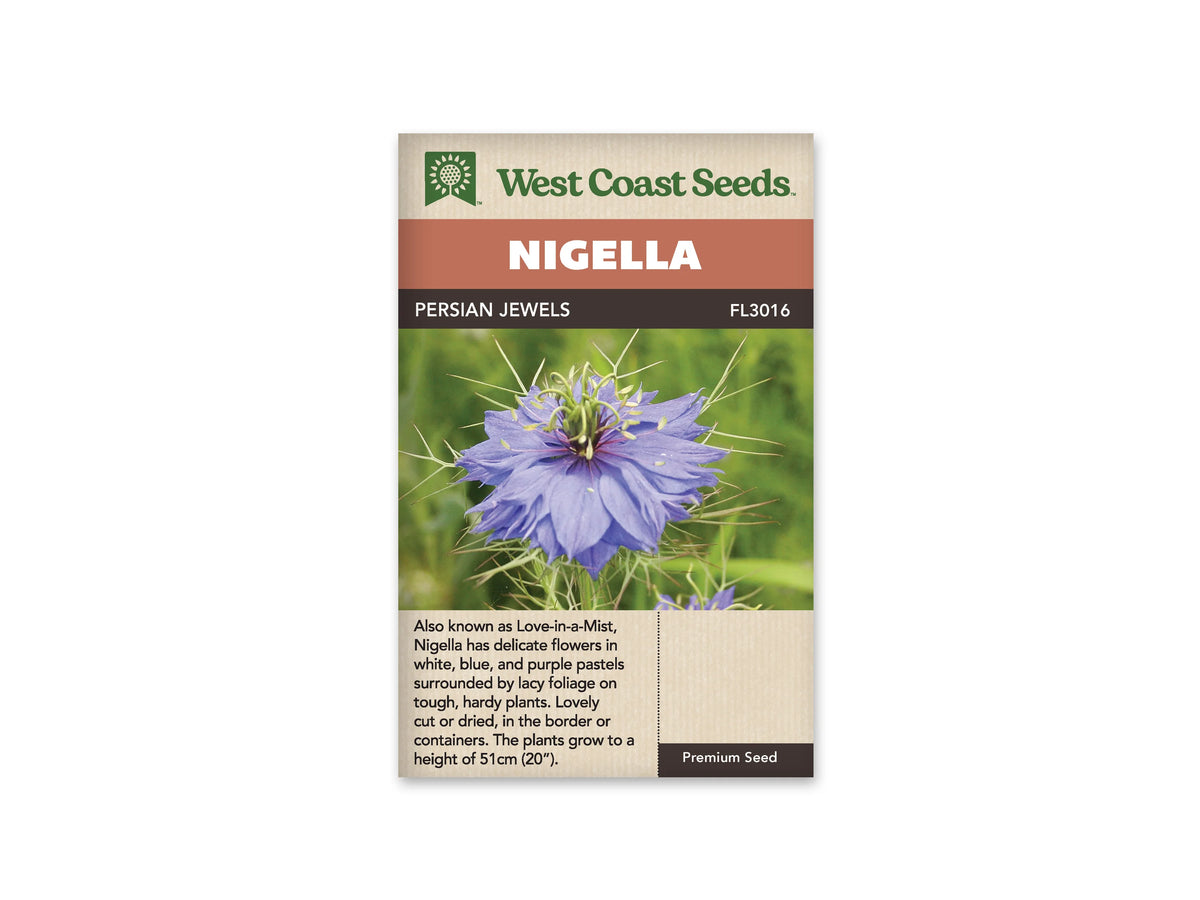 Sachet Persian Jewels de West Coast Seeds sur fond blanc. La photo montre une fleur bleu violet, entourée de très fines bractées vertes. Des étamines claires encerclent son centre vert, dont les pointes sont bien visibles. Le fond est formé de feuillage flou. Le bandeau orange indique Nigella et la bande brune porte Persian Jewels ainsi que le code FL3016.