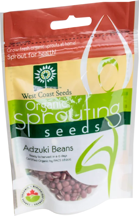 Sachet West Coast Seeds à partie supérieure rouge, avec une étiquette vert jaune portant le nom anglais Adzuki Beans. La fenêtre transparente laisse voir des graines ovales rouges. Le bas blanc de l'emballage présente le logo biologique canadien et les indications de germination. Le délai de 4 à 5 jours est visible sur le devant.