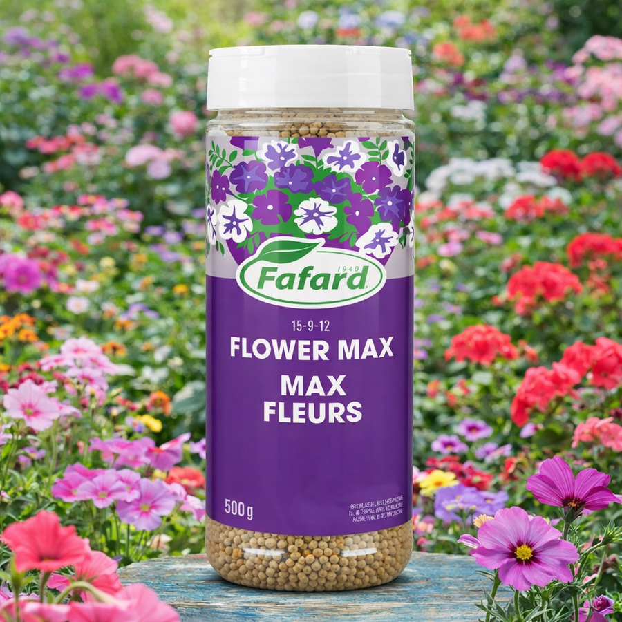 Engrais Fafard Flower Max 15-9-12 en granules, fertilisant pour fleurs et plantes ornementales favorisant une floraison abondante, contenant 500 g, présenté devant un jardin fleuri coloré.