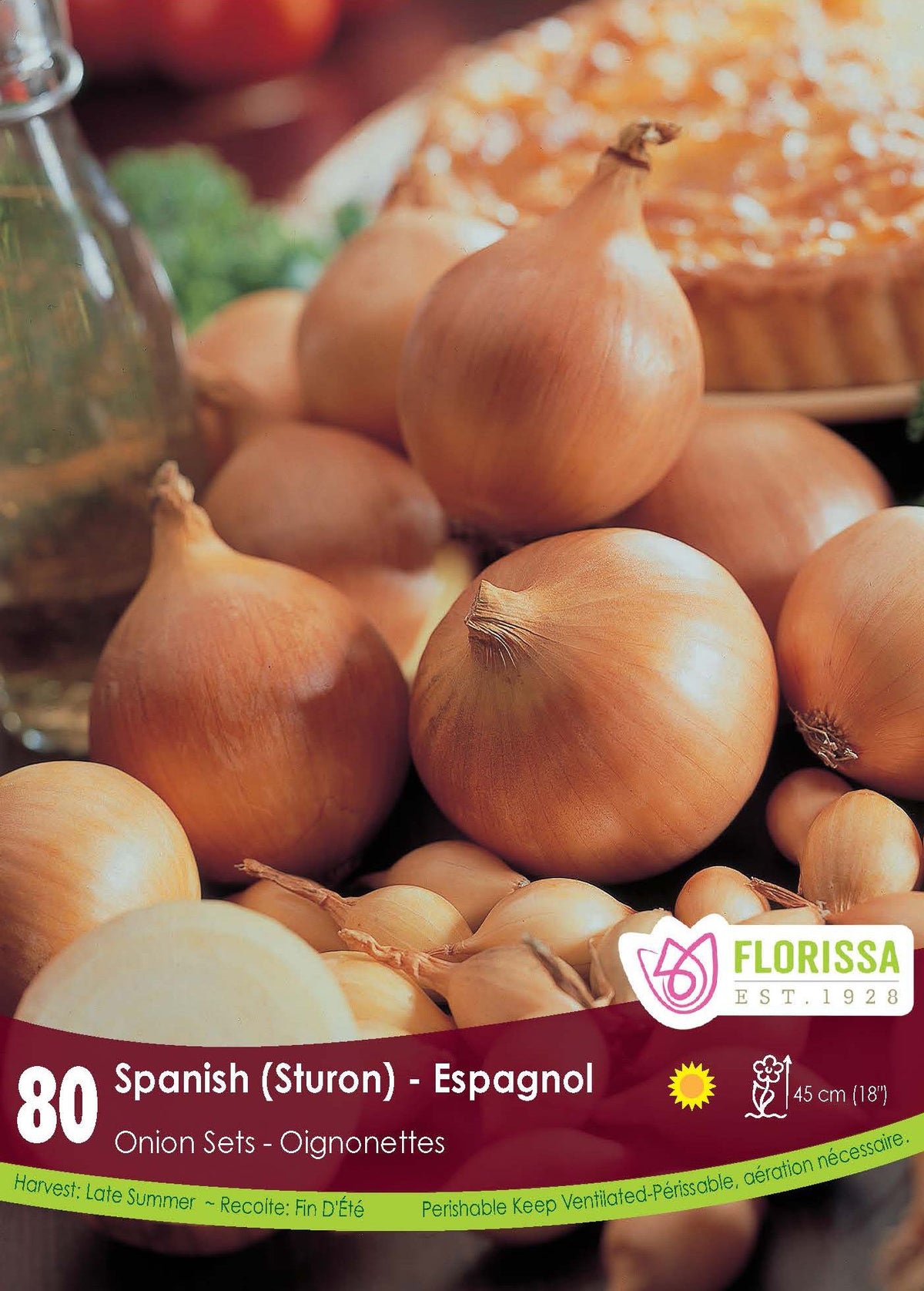 Oignon ‘Espagnol’ ( Allium ) : des oignons dorés entiers, de plusieurs tailles. Le visuel Florissa présente la plante et son nom dans la partie inférieure de l’étiquette. La photographie occupe presque toute la surface, tandis que le bandeau du bas rassemble les indications du produit. Cette vue permet de reconnaître son apparence et de distinguer la variété présentée.