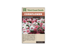 Sachet Classic Romantic de West Coast Seeds sur fond blanc. La photo montre de nombreuses fleurs roses, blanches et rouge foncé. Plusieurs fleurs ont un centre rose et des pointes blanches, avec quelques tiges vertes visibles entre elles. Le bandeau orangé indique Cornflower; Classic Romantic et la référence FL2183 figurent dans la bande brune.