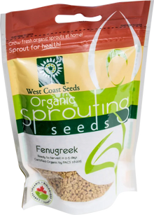 Sachet West Coast Seeds à partie supérieure rouge, avec une étiquette vert jaune portant le nom anglais Fenugreek. La fenêtre transparente laisse voir des graines anguleuses jaune beige. Le bas blanc de l'emballage présente le logo biologique canadien et les indications de germination. Le délai de 2 à 5 jours est visible sur le devant.