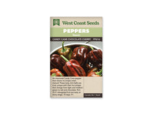 Sachet West Coast Seeds de poivron Candy Cane Chocolate Cherry. La photo montre plusieurs fruits lisses et lobés, brun foncé avec des rayures rouges, et des pédoncules verts. Un fruit allongé occupe le premier plan. Le bandeau vert porte Peppers et Sweet. Le nom de la variété et le code PP616 figurent au-dessus de la photo.