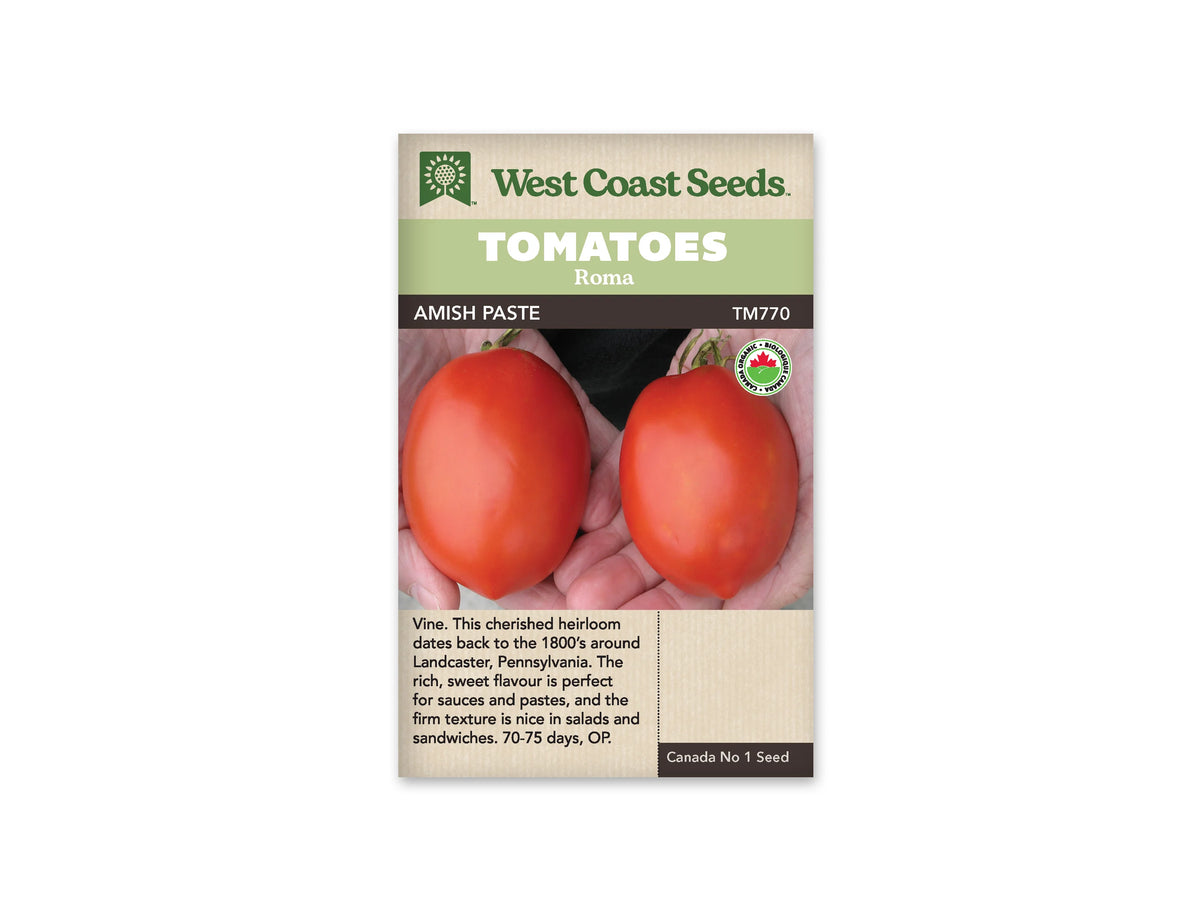 Sachet West Coast Seeds portant les mentions Tomatoes, Roma et Amish Paste. La photo montre deux grosses tomates rouges allongées, soutenues dans des mains, avec une surface lisse et brillante. Un logo biologique rond apparaît sur le côté droit. Le nom de la variété et le code TM770 figurent sous les bandeaux verts de la marque.