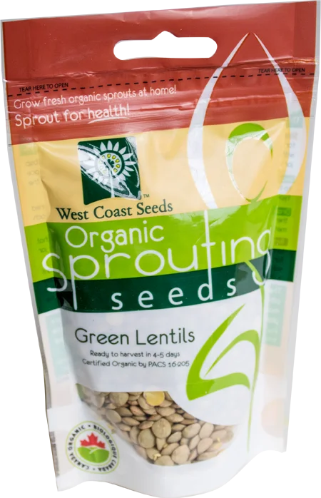 Sachet West Coast Seeds à partie supérieure rouge, avec une étiquette vert jaune portant le nom anglais Green Lentils. La fenêtre transparente laisse voir des graines aplaties gris vert, avec quelques nuances jaunes. Le bas blanc de l'emballage présente le logo biologique canadien et les indications de germination. Le délai de 4 à 5 jours est visible sur le devant.