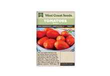 Sachet West Coast Seeds portant les mentions Tomatoes, Roma et San Marzano Lampadina II. La photo montre des tomates rouges allongées réunies dans un bol clair sur un tissu bleu et blanc. Plusieurs fruits présentent un petit bout pointu. Un logo biologique rond apparaît à droite. Le code TM831 figure sous les bandeaux verts.