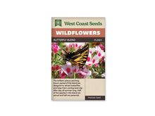 Sachet West Coast Seeds Butterfly Blend montrant un papillon jaune et noir posé sur des fleurs blanches marquées de rose vif. Les ailes relevées présentent des bandes sombres et des prolongements fins vers l’arrière. Des tiges et des feuilles vertes entourent les corolles. Le papillon occupe le centre de la photo, devant les fleurs rapprochées.