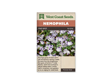 Sachet Five Spot de West Coast Seeds sur fond blanc. La photo présente de nombreuses petites fleurs blanches portant une tache violette au bout de chaque pétale. Des feuilles vertes découpées et de fines tiges apparaissent entre les fleurs. Le bandeau orange indique Nemophila; la bande brune porte Five Spot et FL1216. Un texte descriptif figure au bas.