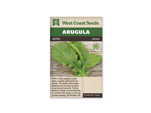 Sachet de semences de roquette Astro de West Coast Seeds, présenté de face sur fond blanc. Le bandeau vert porte le nom anglais Arugula et la bande foncée indique la référence MS504. La photographie montre plusieurs feuilles vertes assez larges, peu découpées, disposées sur des planches de bois. Un symbole biologique canadien figure à droite de la photo.