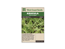 Sachet West Coast Seeds de roquette sauvage, présenté de face sur fond blanc. Les mentions Arugula et Wild Arugula apparaissent dans le bandeau vert, au-dessus de la référence MS500. La photographie montre un ensemble de feuilles vertes étroites et profondément découpées, avec des tiges visibles entre elles. La partie beige inférieure contient une description et des renseignements de culture imprimés en anglais.