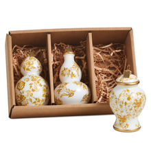 Coffret de 3 ornements en forme de pots blancs à motifs dorés