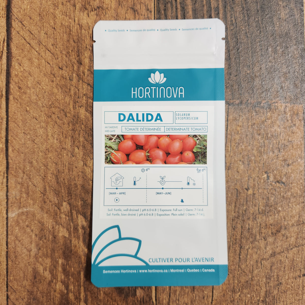 Semences Hortinova de Tomate de champs 'Dalida', produit destiné au potager et présenté pour identifier clairement le cultivar avant le semis. Vue 2 de l'emballage ou du produit, à utiliser comme repère visuel avec les conseils de culture, l'exposition, l'arrosage et la récolte indiqués dans la fiche française de Pépinière.ca.