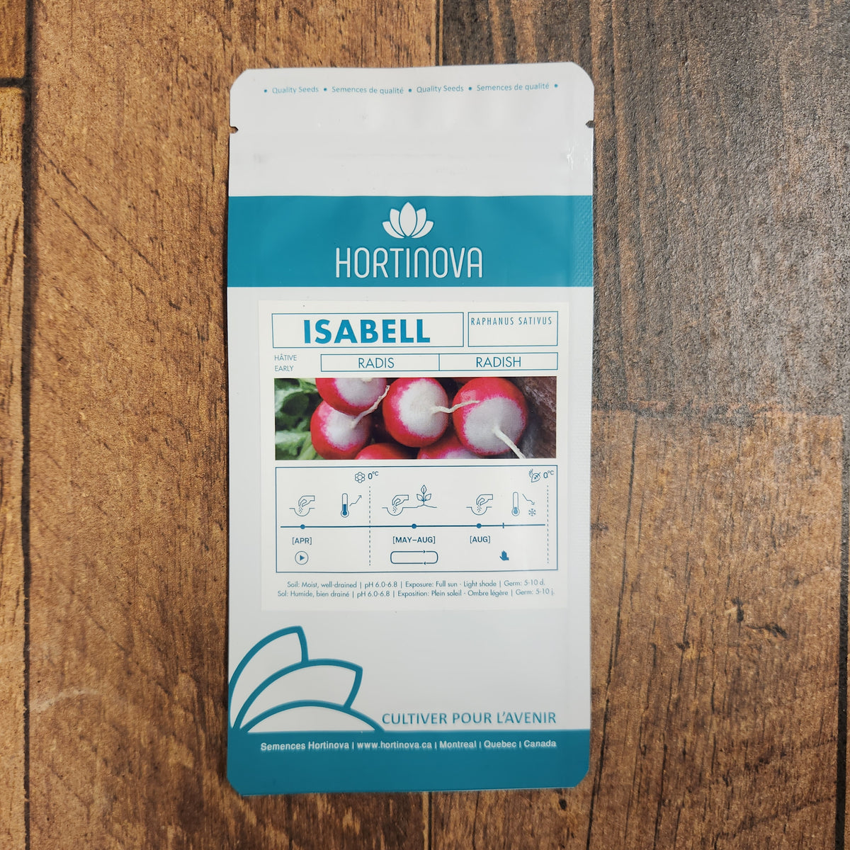 Semences Hortinova de Radis 'Isabell', produit destiné au potager et présenté pour identifier clairement le cultivar avant le semis. Vue 2 de l'emballage ou du produit, à utiliser comme repère visuel avec les conseils de culture, l'exposition, l'arrosage et la récolte indiqués dans la fiche française de Pépinière.ca. Pour Radis 'Isabell', des observations régulières permettent d'ajuster les soins aux conditions réelles du jardin.